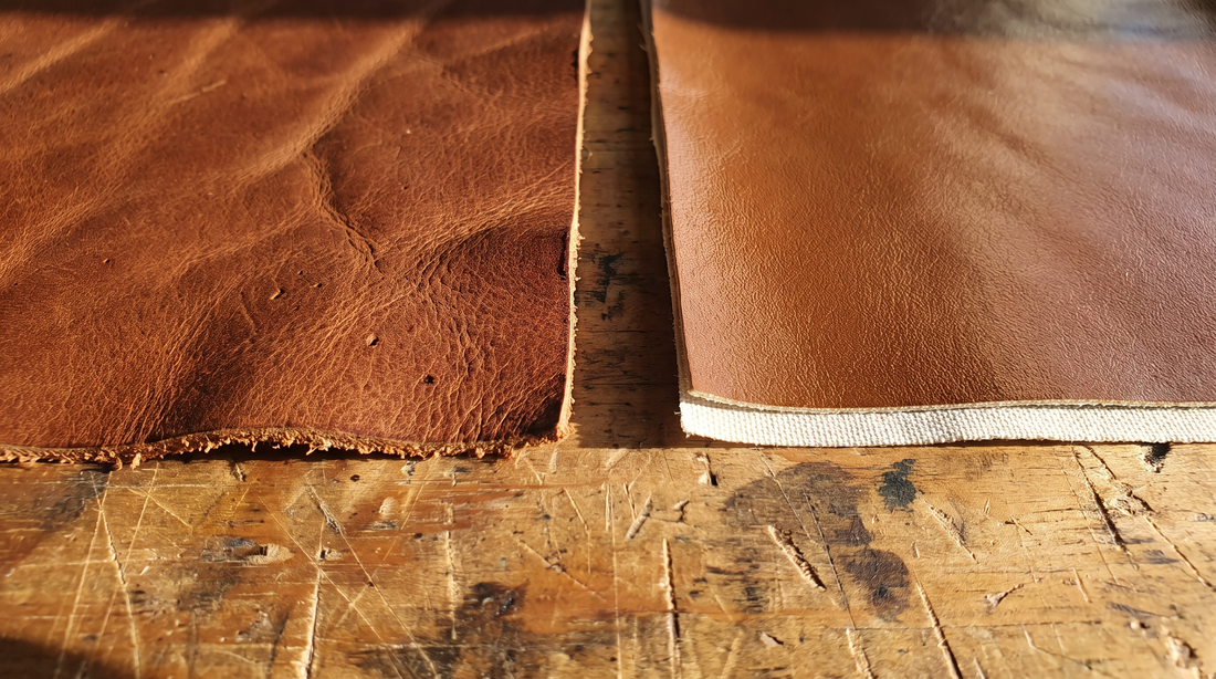 A piece of real leather with a rough cut edge beside a smooth faux leather sheet with a fabric backing showing at its edge