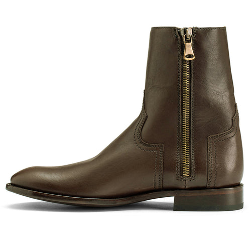 The Heritage Boot brown leather, side profile showing the gold zip.