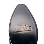 Close-up of the leather sole on The Trinity boot in black, stamped with the Alvies logo