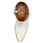 Top-down view into a white Trinity boot showing the tan lining stamped Made With Soul