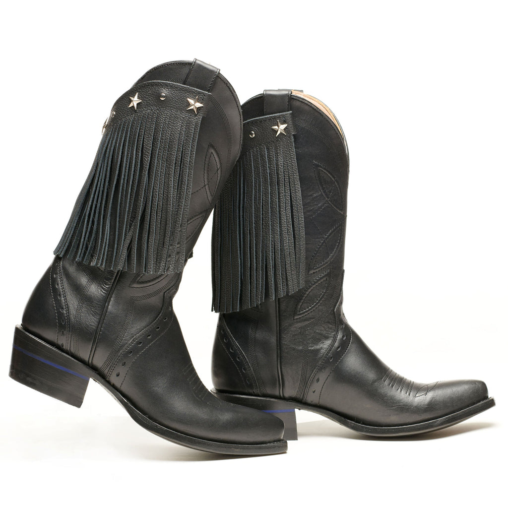 Boot Fringe in Friesian Dressage Black with star studs on black leather boots.