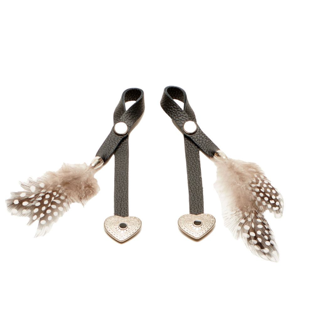 Feathered Boot Charm pair in black leather with heart charms and speckled feathers.