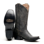 The Shoal Creek pair with one boot tipped to show the sole and Alvies stamp
