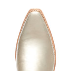 Close-up of the toe seam and stitching on The Trinity boot in champagne leather