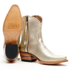 Top-down view into a champagne Trinity boot showing lining stamped Made With Soul