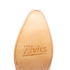 Close-up of the tan leather sole on The Trinity boot in champagne, stamped Alvies