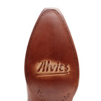 Close-up of the leather sole on The Trinity boot in cognac, stamped with Alvies logo