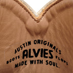 Close-up inside The Trinity boot in champagne showing the Alvies leather stamp