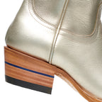 Front view of The Trinity ankle boots in metallic champagne leather, paired together