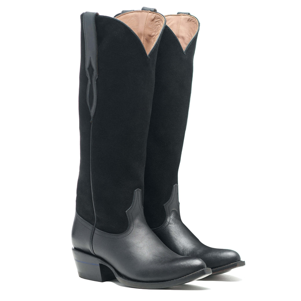 Front three-quarter view of the black suede Perry Lane boots