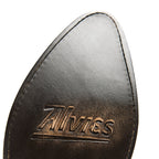 Sole close-up of The 6th Street brown boot with Alvies logo embossed in leather.