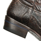 Close-up of the brown stacked heel with signature blue stripe on The 6th Street.