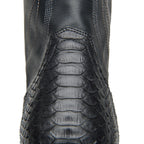 Rear heel counter close-up of The 6th Street in black python with contrast stitching.