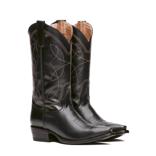 Black leather Comal boots posed together in studio, snip toe pointed forward