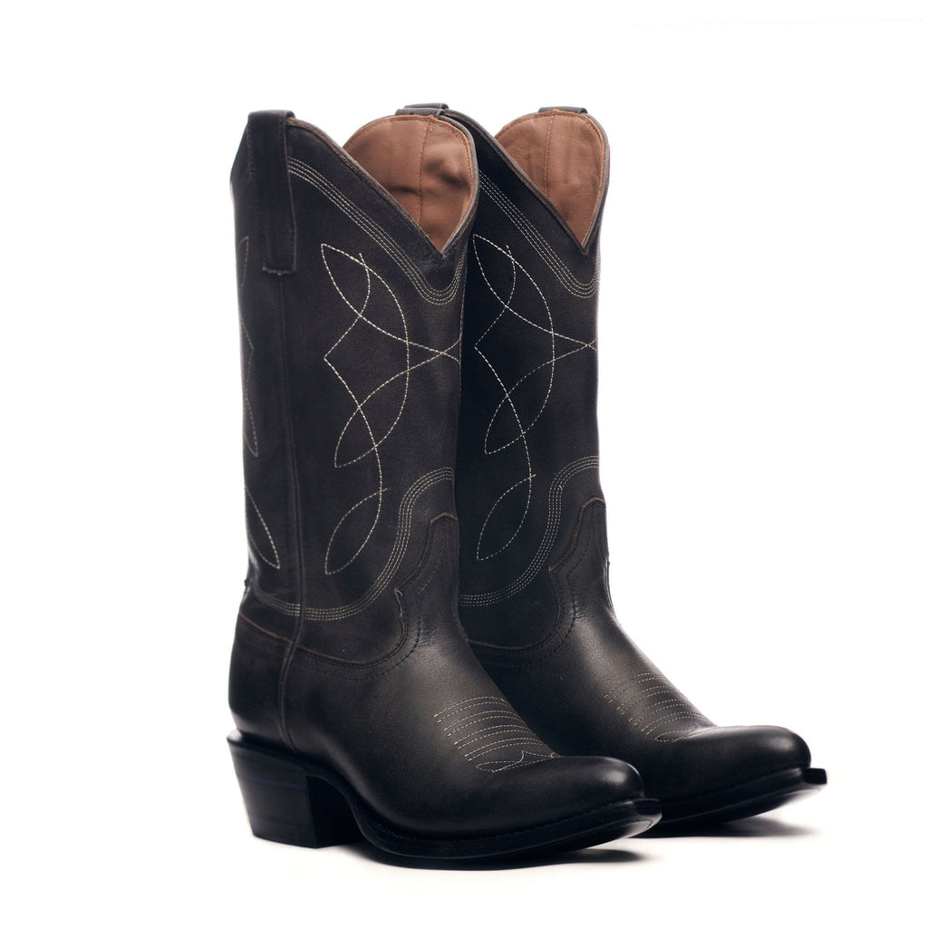 Pair of black Guadalupe boots, angled front view on a white background.